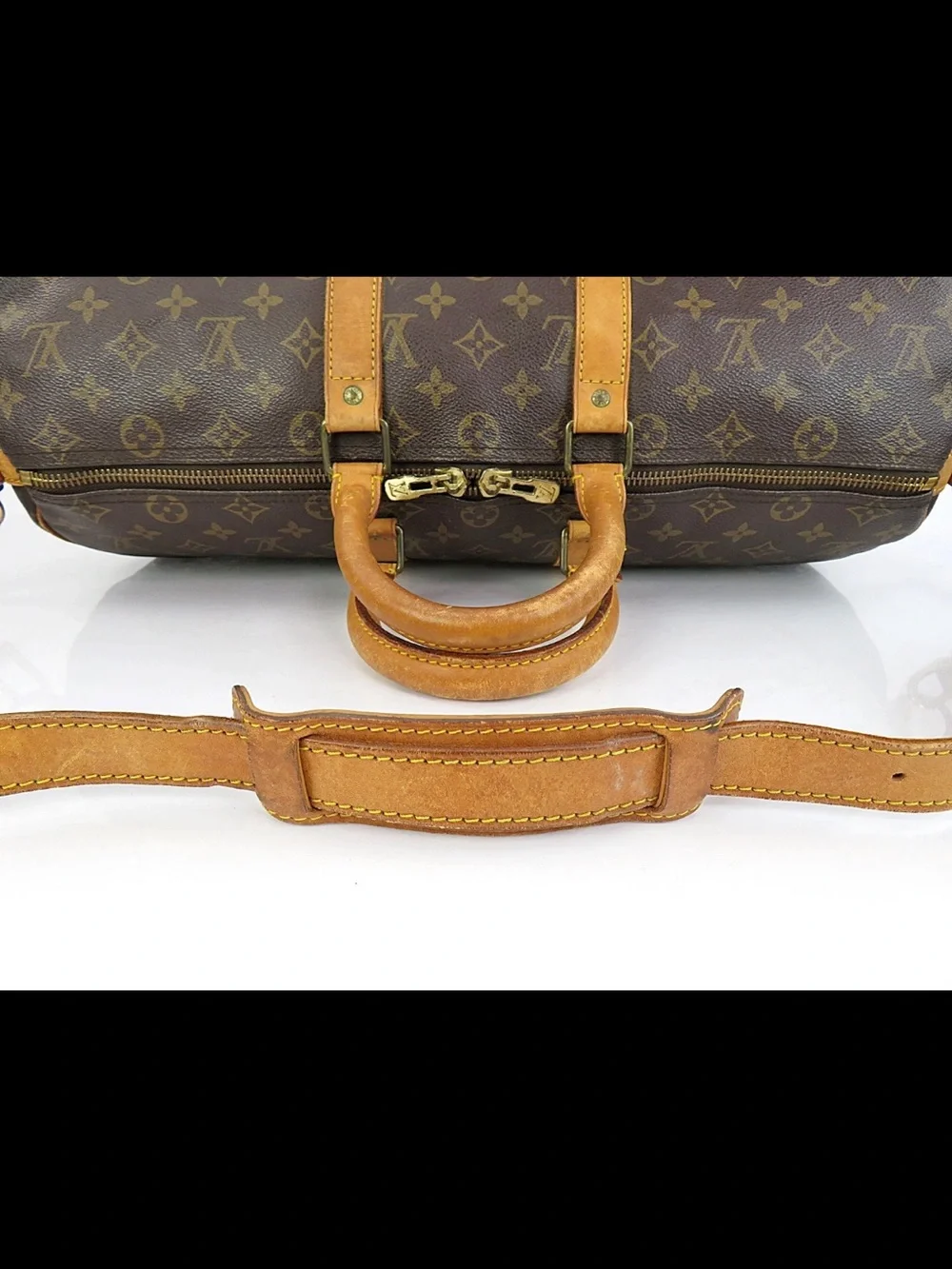 Louis Vuitton Brown Monogram Travel Duffel with Tan Leather Strap